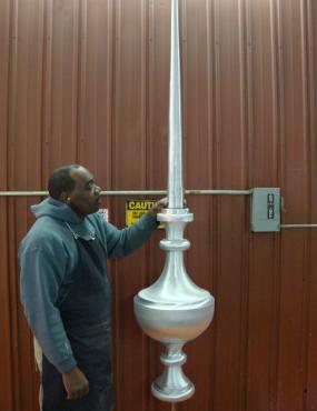 Tall, decorative finials can be used as strike termination devices.